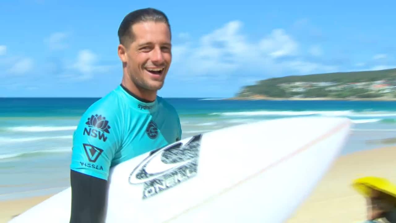 Soli Bailey emerges from the water after his heat at Manly.