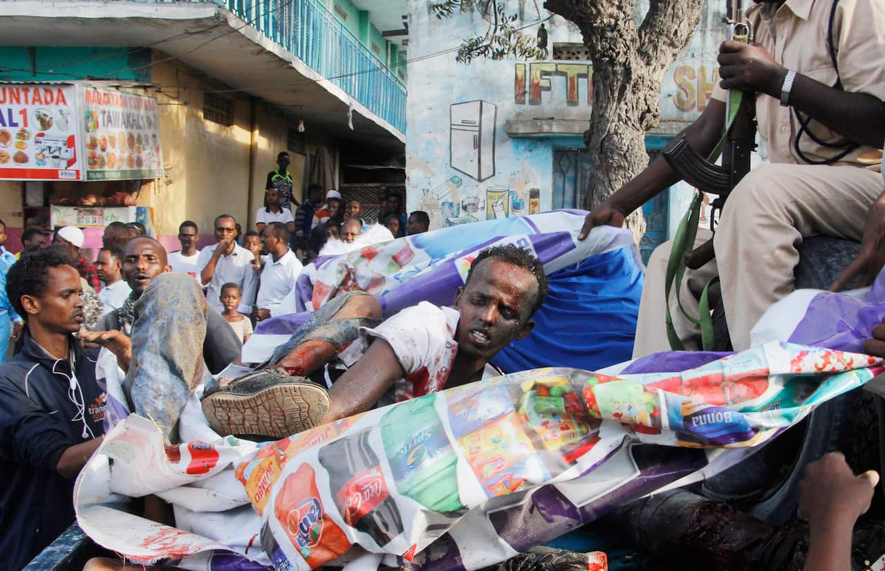 An injured civilian who was wounded during the car bombing. (AAP)  
