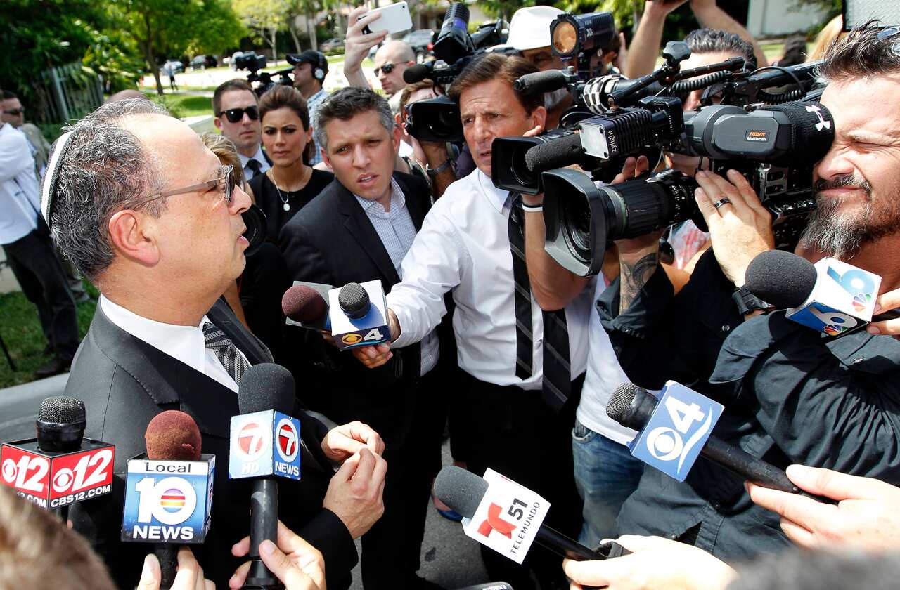 Rabbi Terry Bookman speaks with reporters following the memorial service for Steven Sotloff.