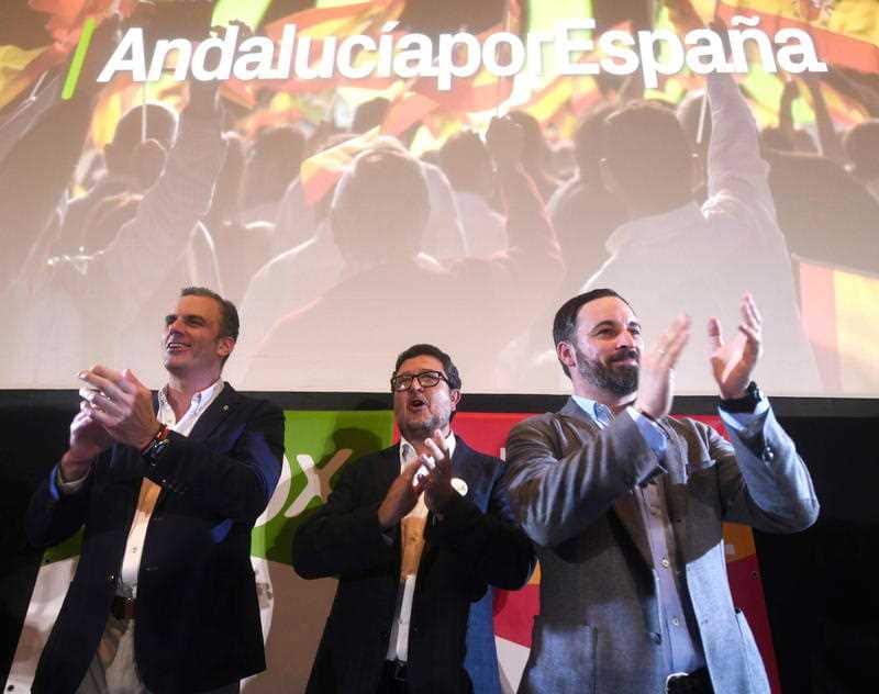 General Secretary of right-wing party Vox, Javier Ortega (L), Andalusia presidential candidate Francisco Serrano (C) and Vox's President Santiago Abascal.