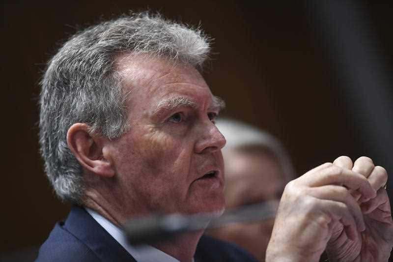 Director General of ASIO Duncan Lewis appears at a Senate estimates hearing at Parliament House.