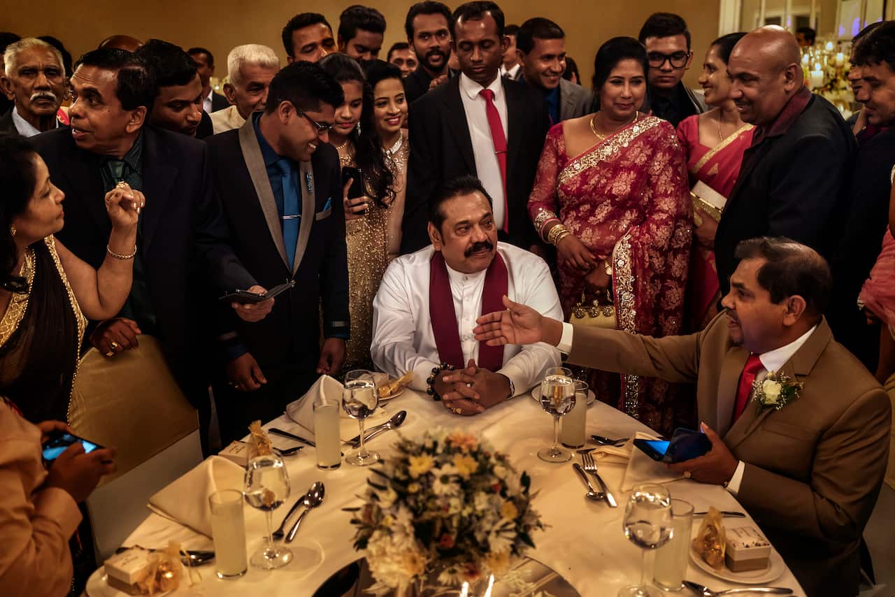 Sri Lankas former president, Mahinda Rajapaksa, at a wedding in Colombo, Sri Lanka.