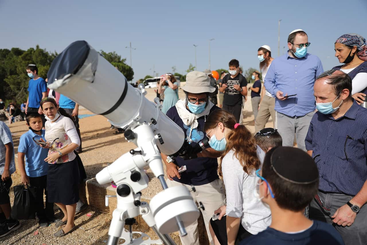 Stargazers in Jerusalem, Israel on 21 June 2020.  