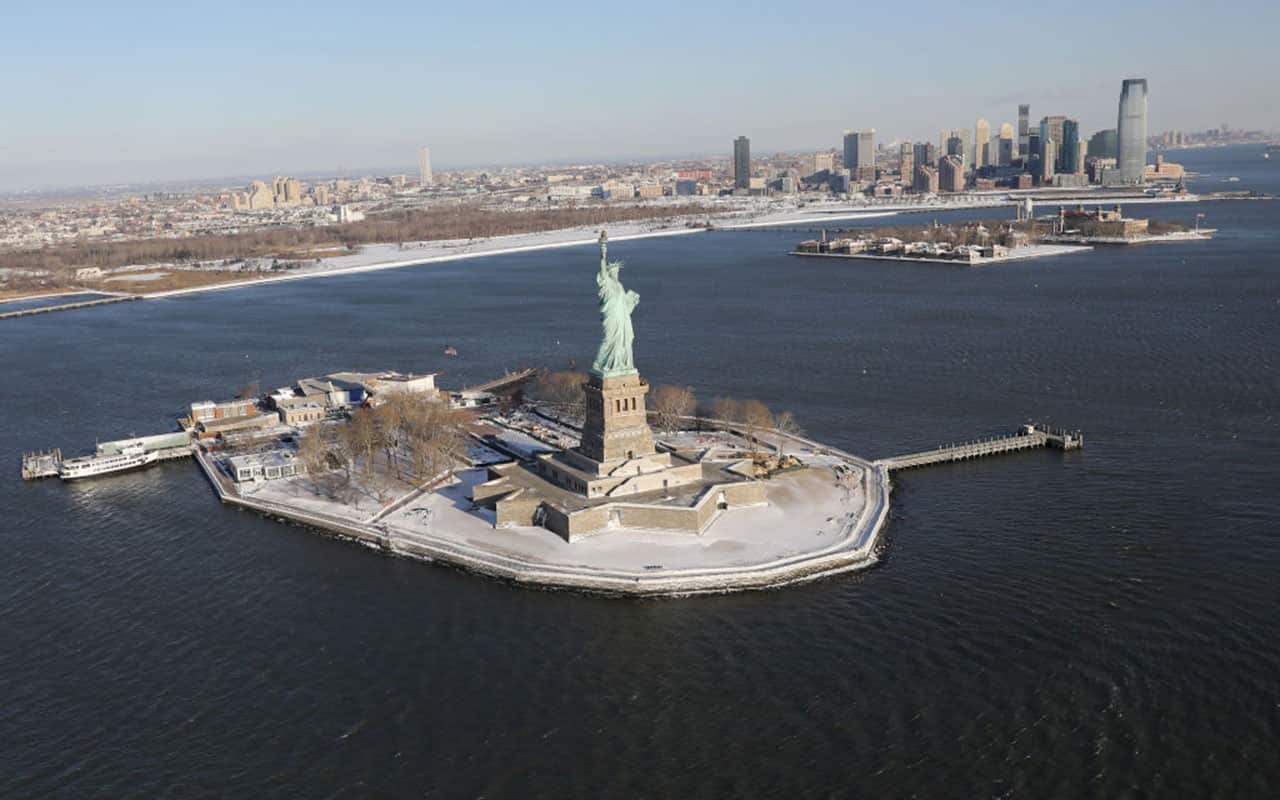A blanket of snow covers Liberty Island on January 5, 2018 in New York City. Under frigid temperatures, New York City dug out from the 'Bomb Cyclone'.