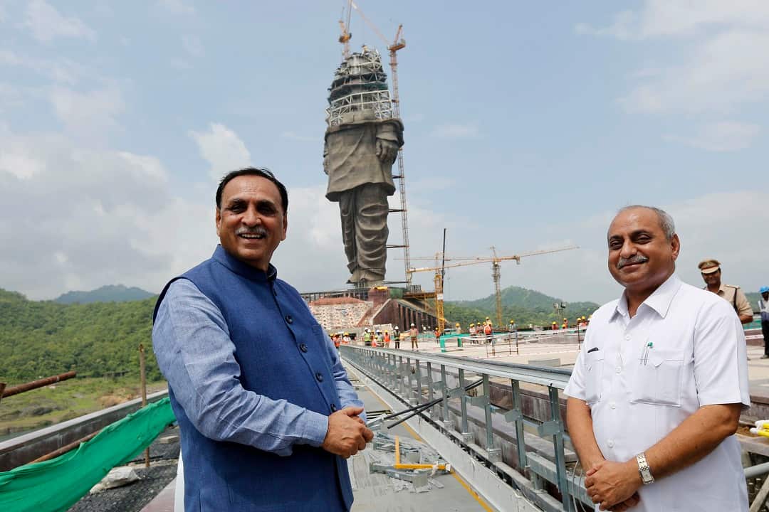 Gujarat chief minister Vijay Rupani, left and deputy chief minister Nitin Patel inspect the construction site of the Statue of Unity. 