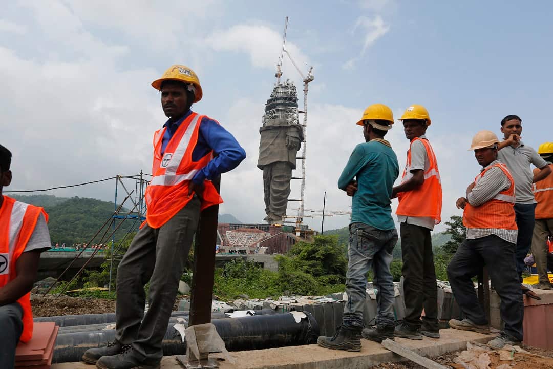 Indian workers take a break from building the Statue of Unity which is set to be more than double the size of the United States' Statue of Liberty. 