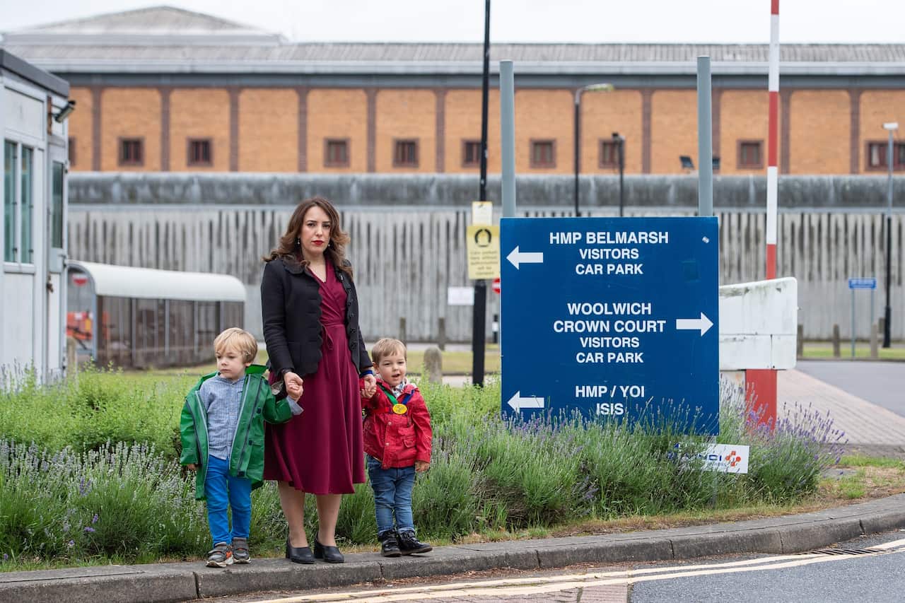 Stella Moris stands with her children Gabriel and Max outside Belmarsh Prison, London, following a visit with Julian Assange. 