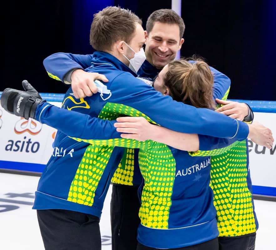 Tahli and Dean celebrate qualifying with their coach