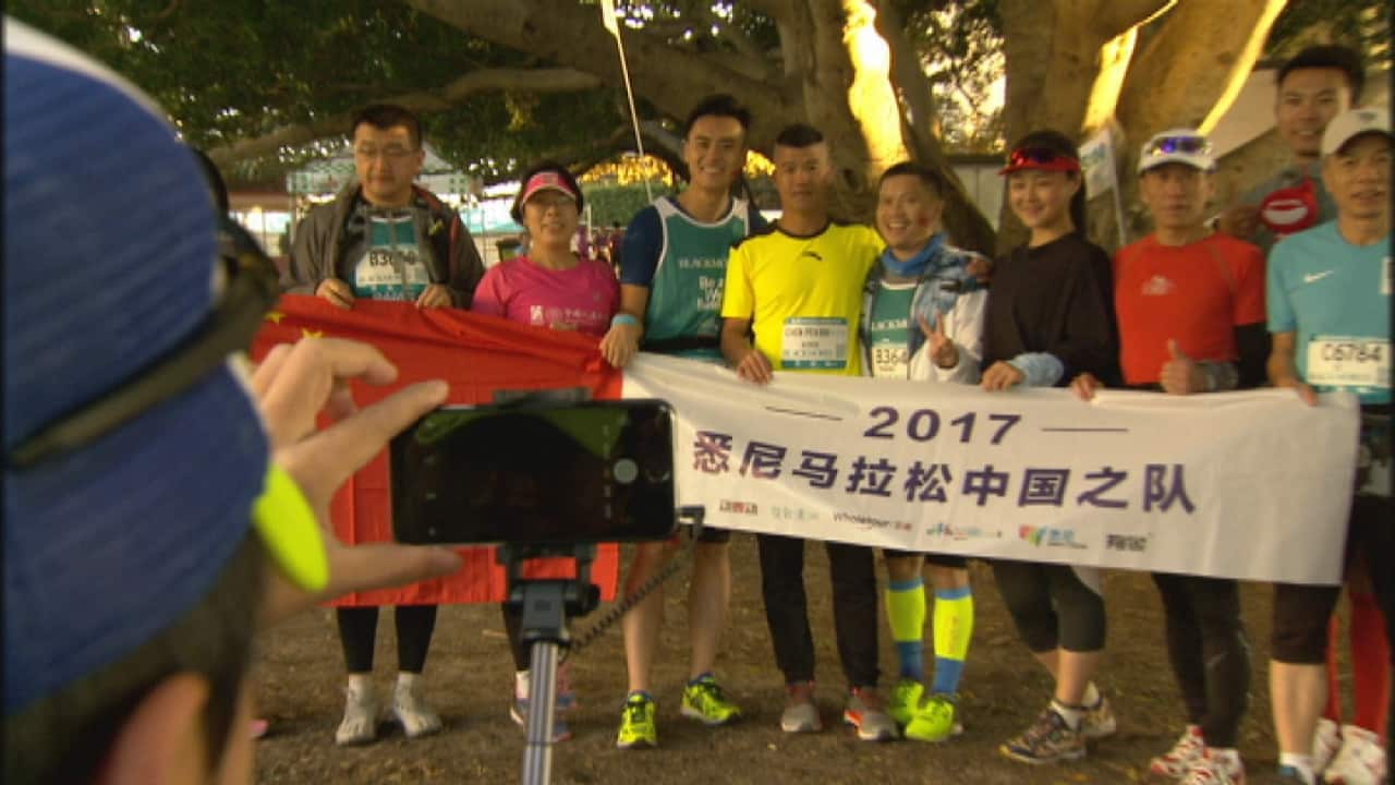 Marathon runner Chen Penbin with his supporters