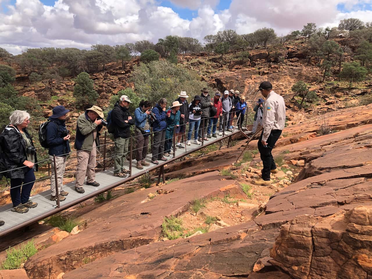Part of the tour is an explanation of engravings in rock that form a sort of storyboard, the arches depict shelters and circles can represent waterholes.