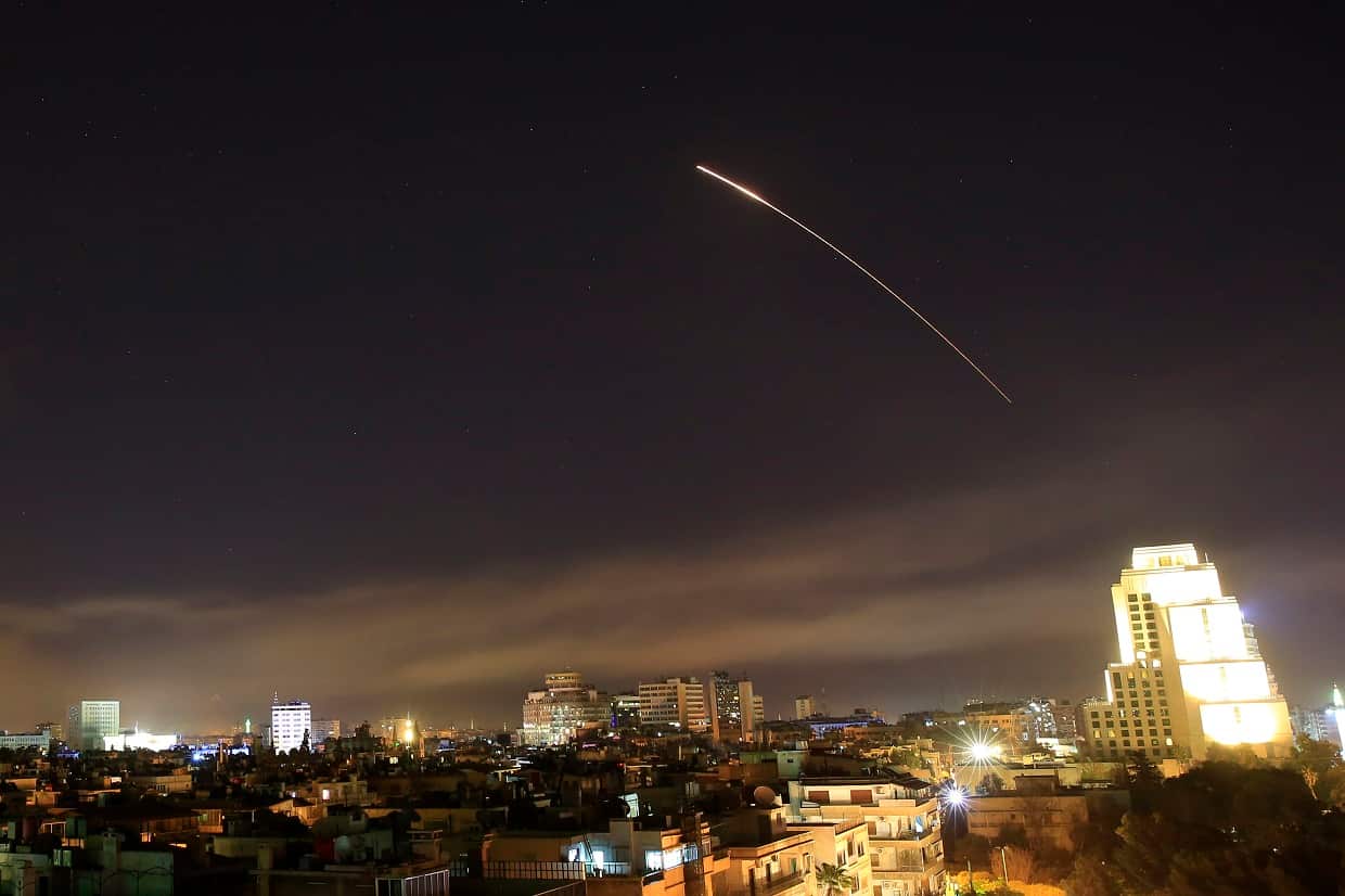 Damascus skies erupt with missile fire as the US launches an attack on Syria targeting different parts of the capital Syria, early Saturday.