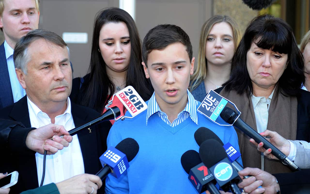 Ralph Kelly (front left) with Stuart Kelly and Kathy Kelly speak with media in 2014. 