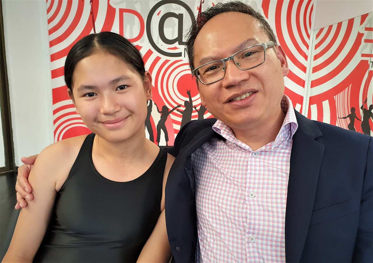 Dance student Bonnie Zheng with her father John.