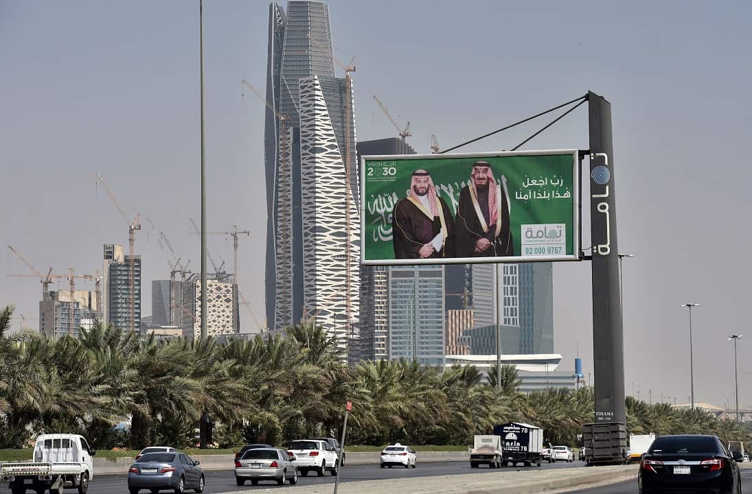 Portraits of Saudi King Salmanand, right, and his son Crown Prince Mohammed bin Salman (MBS) can be seen in Riyadh ahead of the summit.