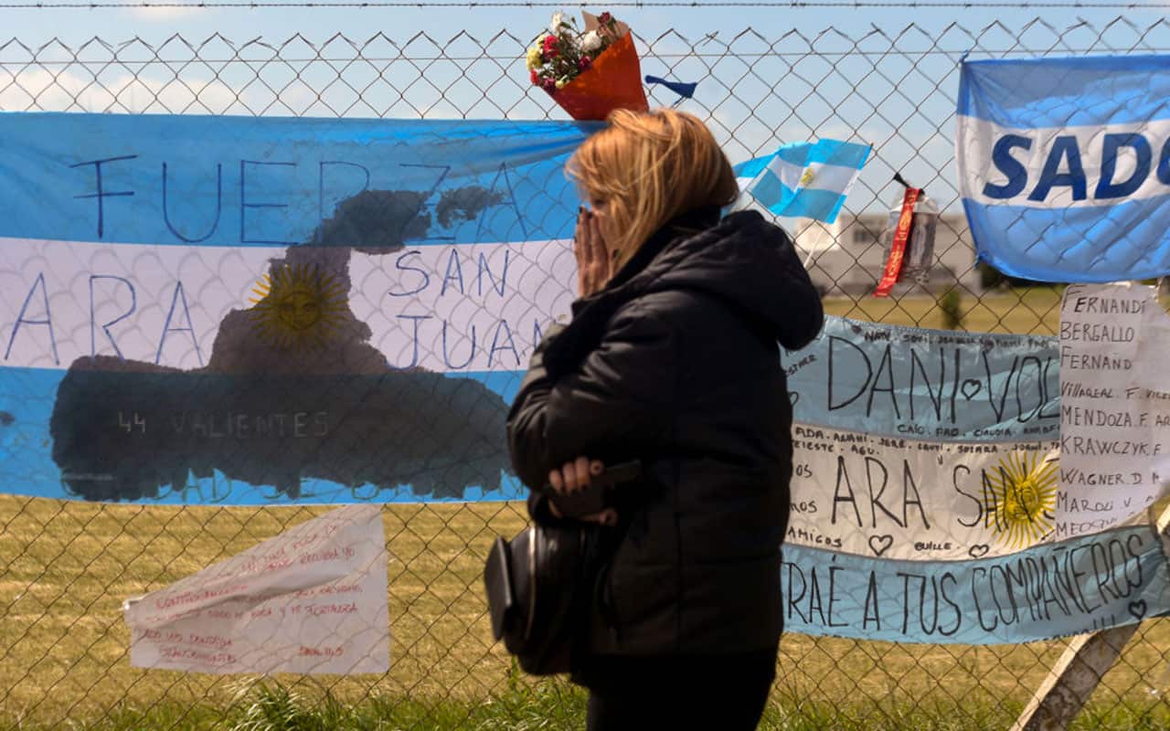 A relative of missing Argentine submarine crew member Alejandro Damian Tagliapietra, expresses her grief outside Argentina's Navy base.
