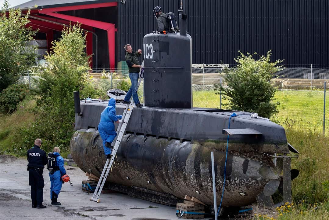 August 2017: Police technicians examine the UC3 Nautilus on a pier in Copenhagen.