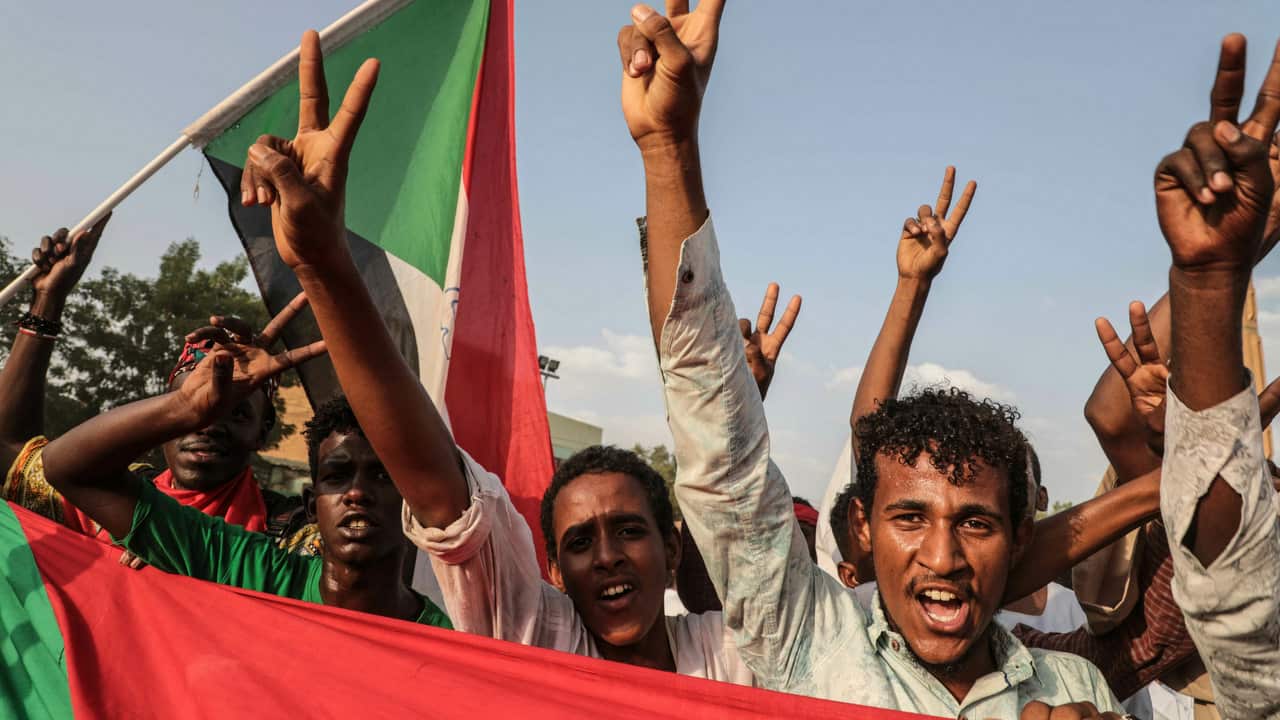 Sudanese people celebrate in the streets of Khartoum after ruling generals and protest leaders announced they have reached an agreement.