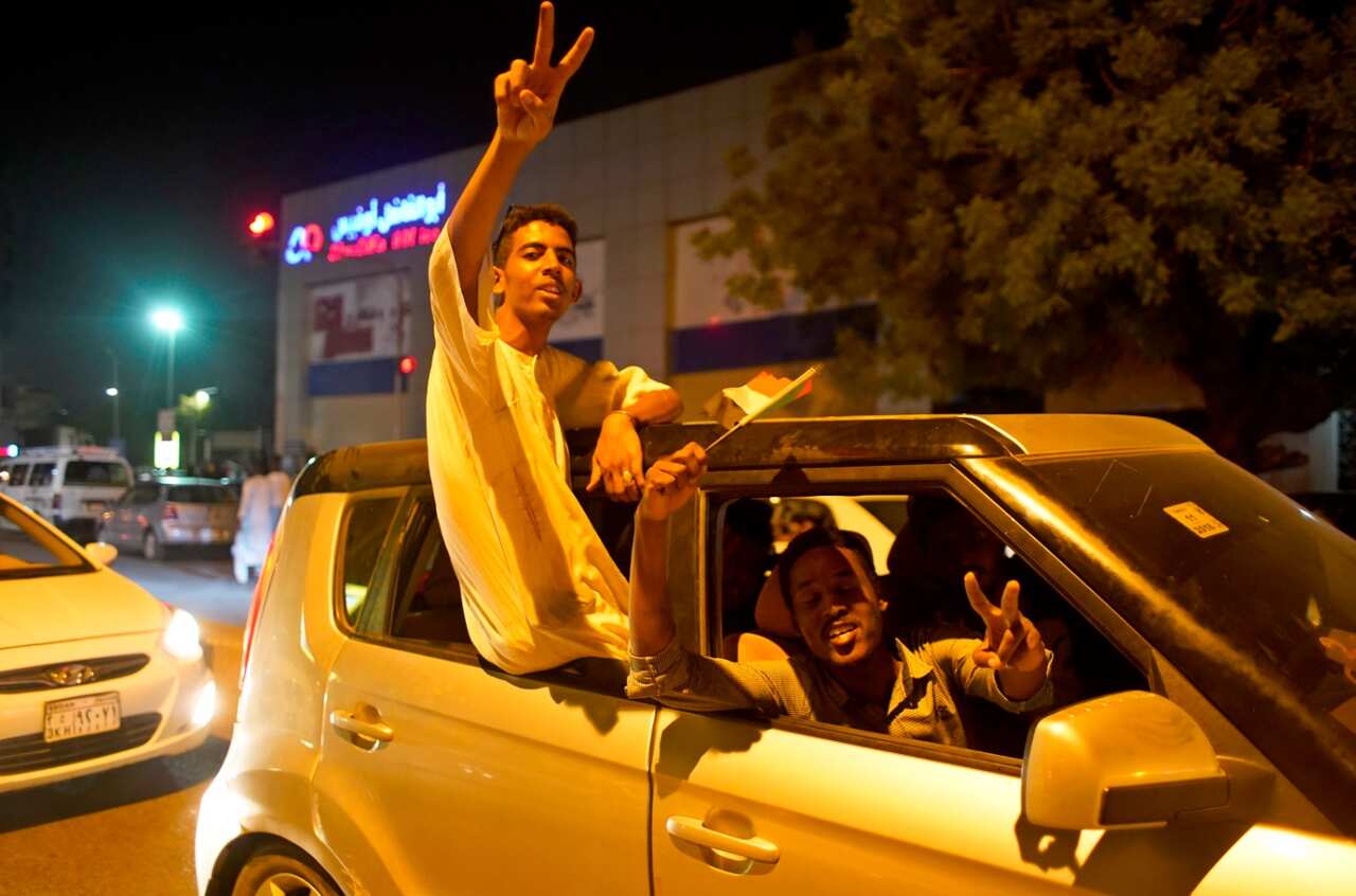 Sudanese people gather to celebrate in the streets of Khartoum, Sudan, 12 April 2019.