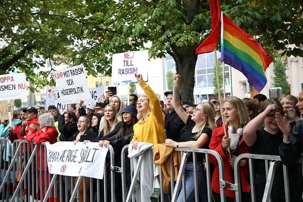 People protest during a campaign visit of the Sweden Democrats party's leader in Gothenburg on August 28.