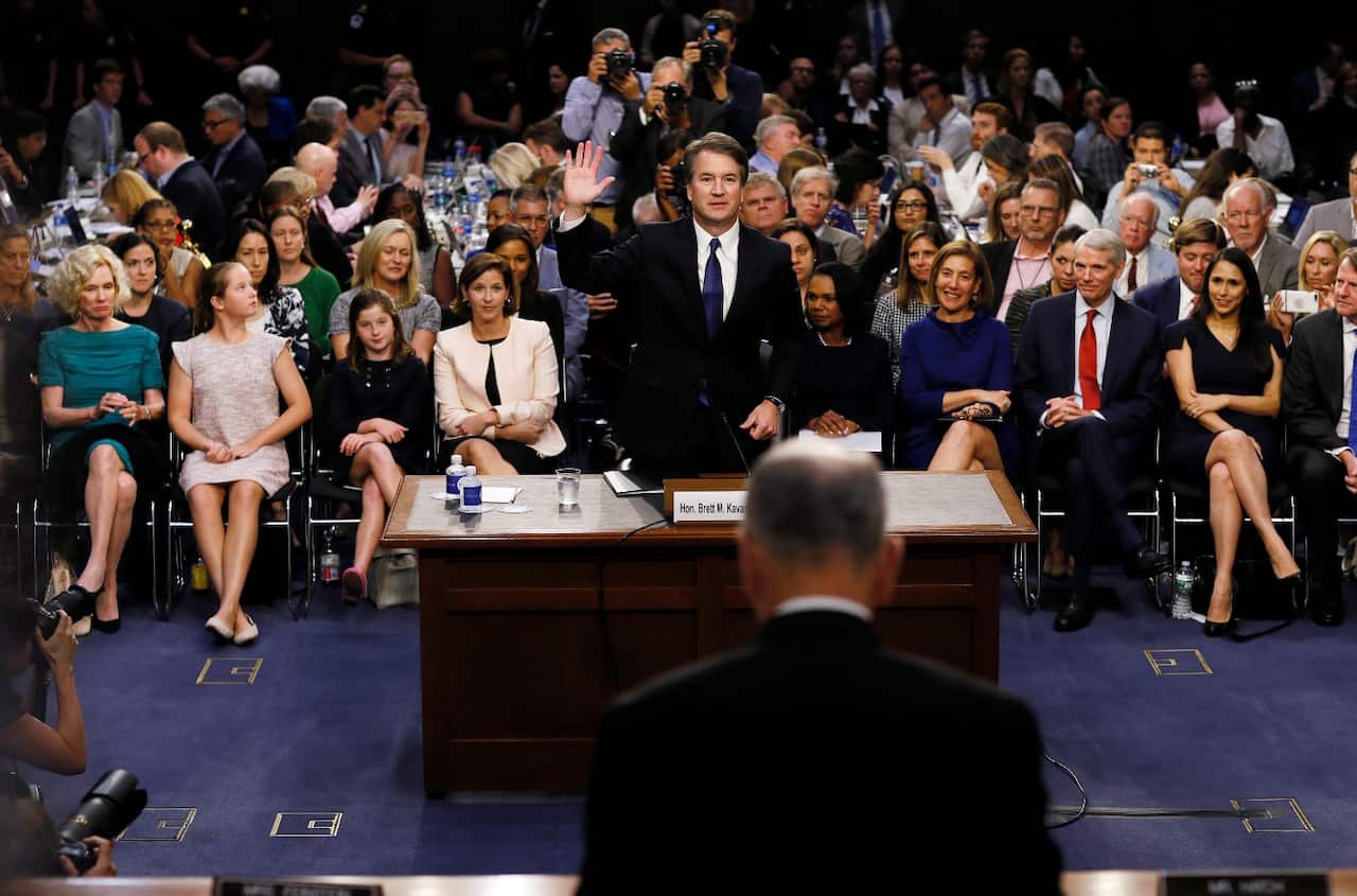 President Donald Trump's Supreme Court nominee Brett Kavanaugh is sworn-in by committee chairman Sen. Chuck Grassley of Iowa