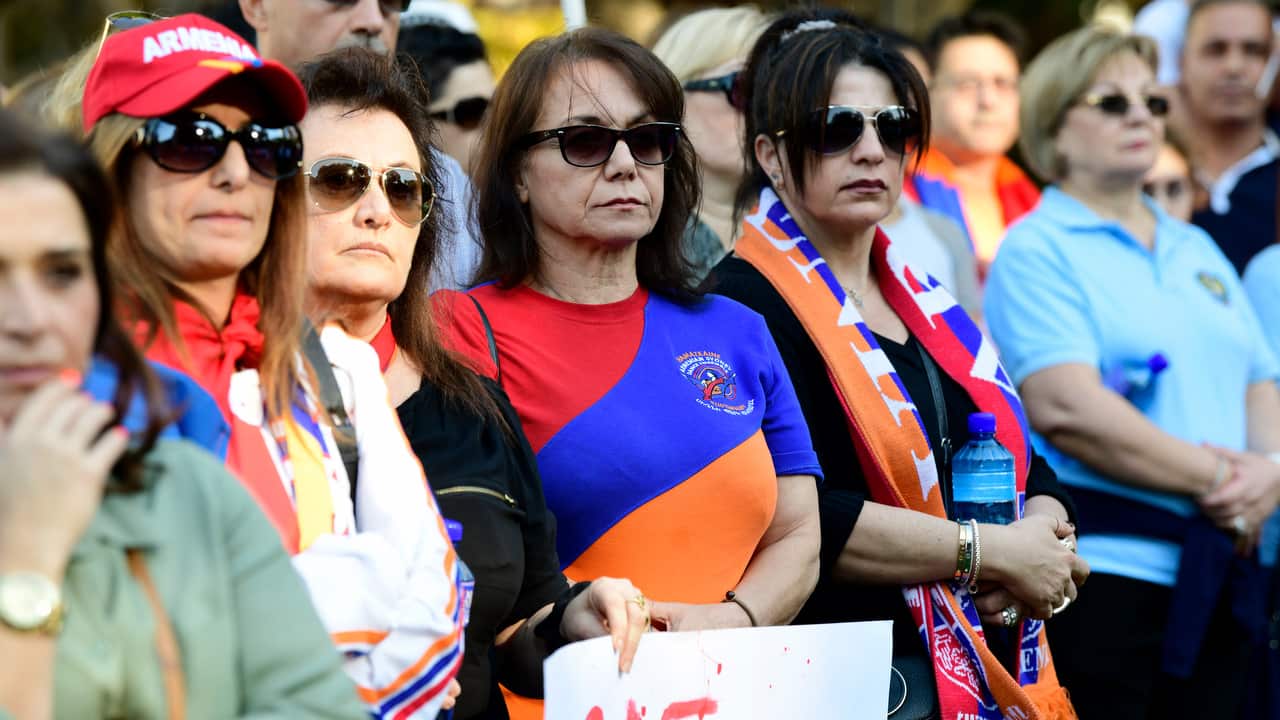 Protesters backed calls by the NSW Premier, urging the federal government to recognise the 1915 mass killings.