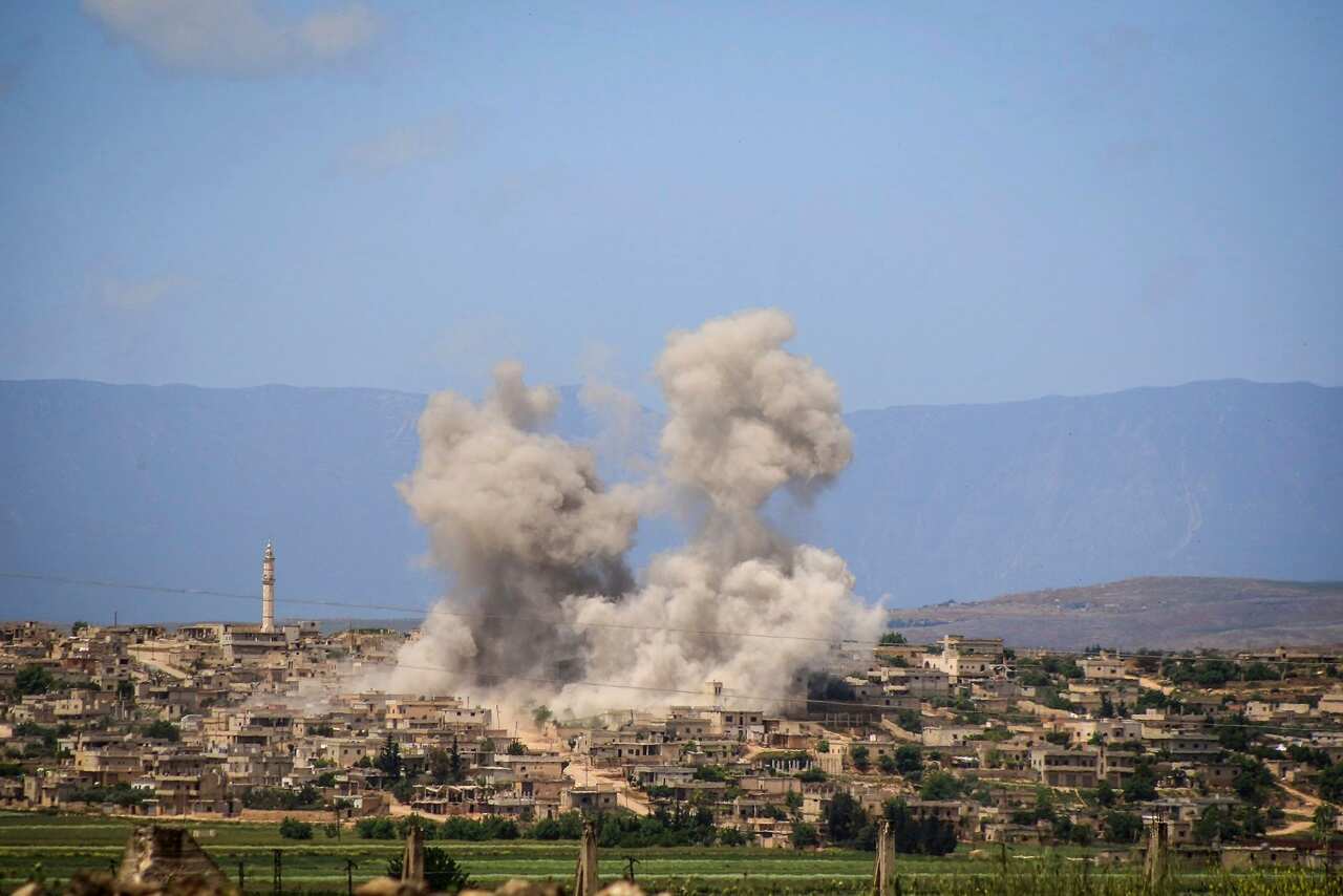 Smoke rising after Syrian government and Russian airstrikes that hit the town of al-Habeet, southern Idlib, Syria on 3 May, 2019.