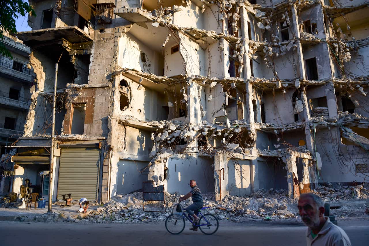 Residential buildings destroyed during the war by government forces in eastern Aleppo, Syria, June 22, 2019. (Meridith Kohut/The New York Times)