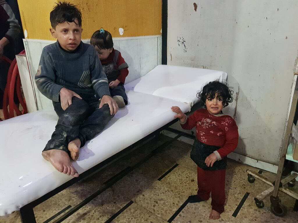 Affected Syrian kids wait to receive medical treatment after Assad regime forces allegedly conducted poisonous gas attack.