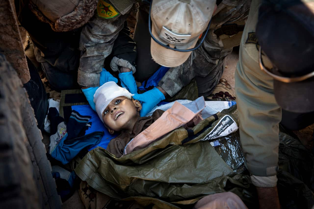 A 6-year-old boy is treated at a first aid station staffed by recently arrived American aid workers in Deir al-Zour, Syria, on Feb. 3, 2019. 