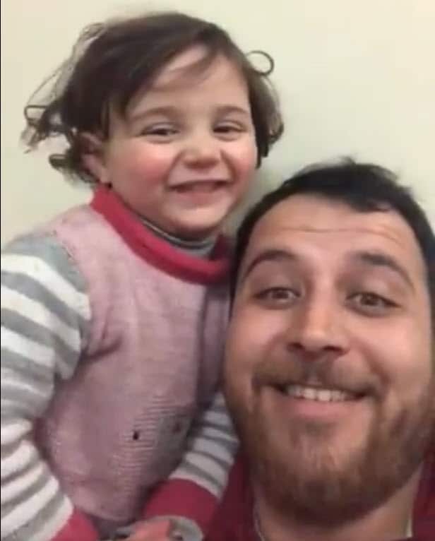 Abdullah Mohammad is using laughter to distract his young daughter from the horrors of war.