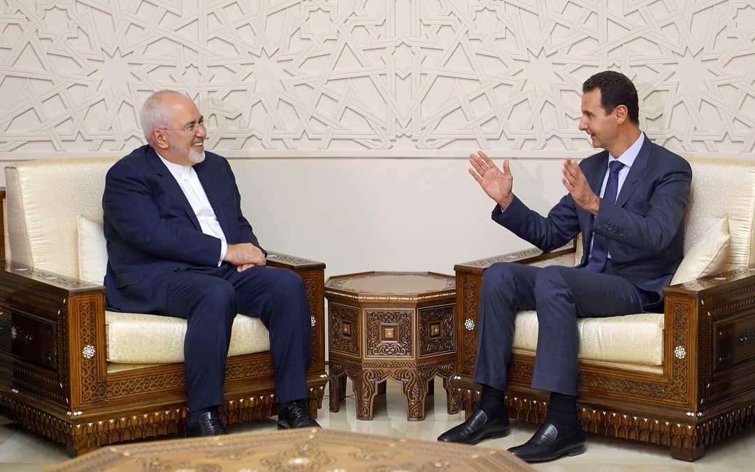 Syrian President Bashar Assad (R) met Iranian Foreign Minister Mohammad Javad Zarif in Damascus. 