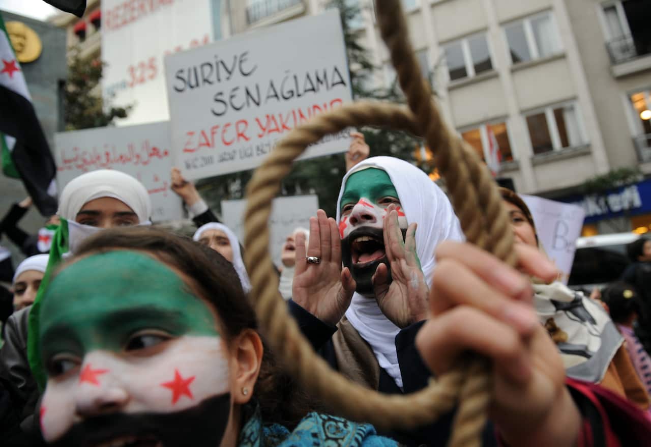 syria_protest_131220_getty.JPG