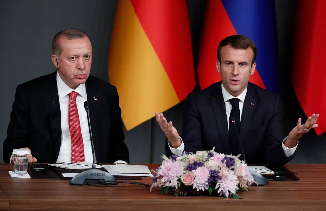 France's President Emmanuel Macron, right, and Turkey's President Recep Tayyip Erdogan say they want to achieving lasting peace in Syria. 