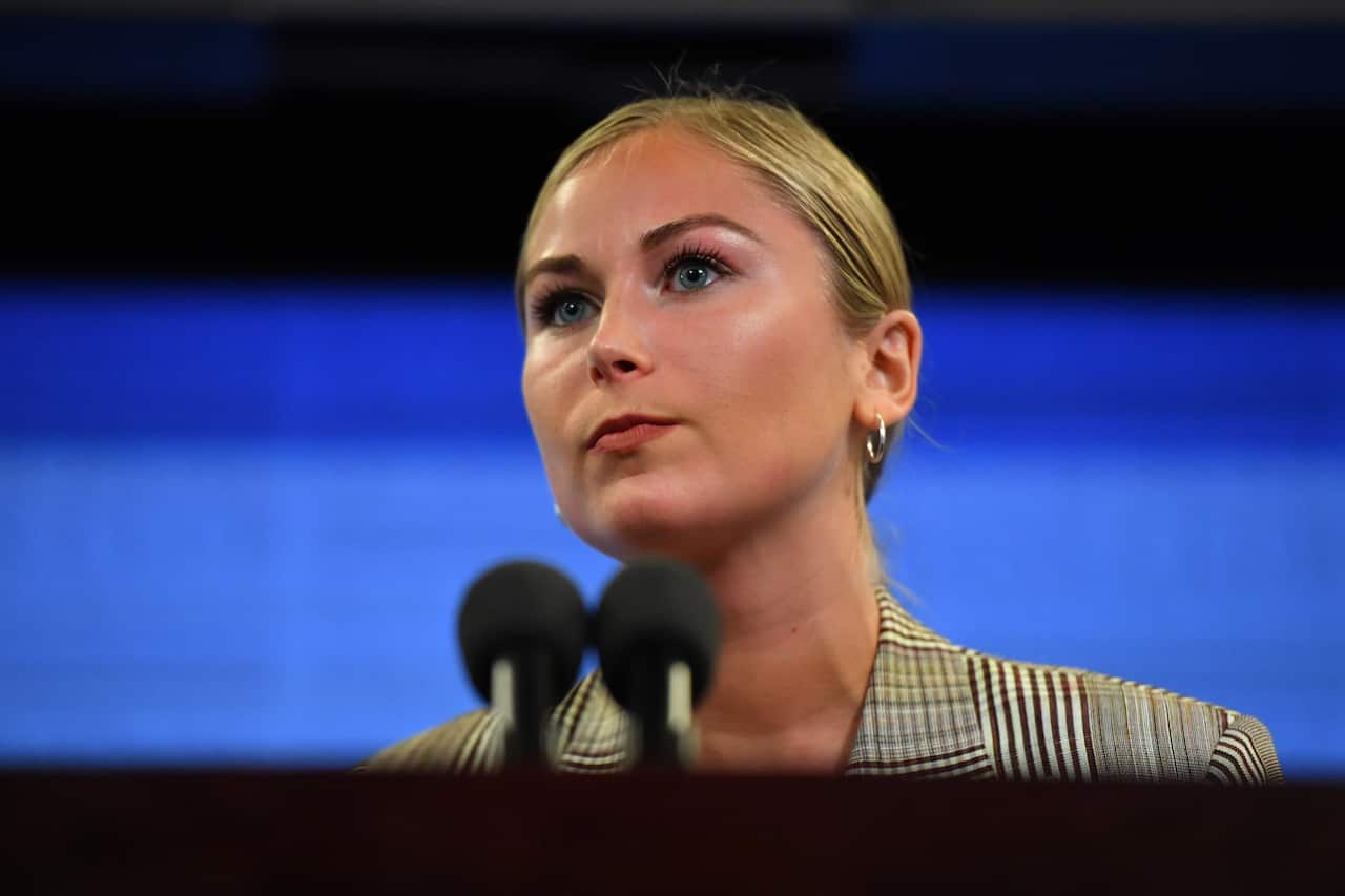 2021 Australian of the Year Grace Tame addresses the National Press Club in Canberra, Wednesday, March 3, 2021. (AAP Image/Mick Tsikas) NO ARCHIVING