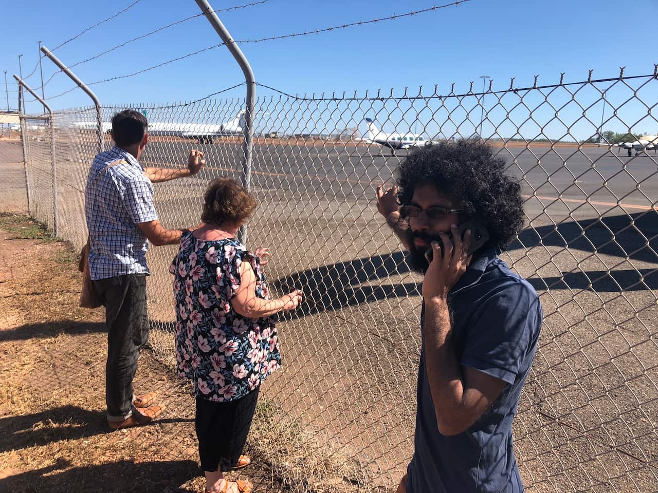 Supporters of a Tamil refugee familyat Darwin International Airport, awaiting the deportation. 
