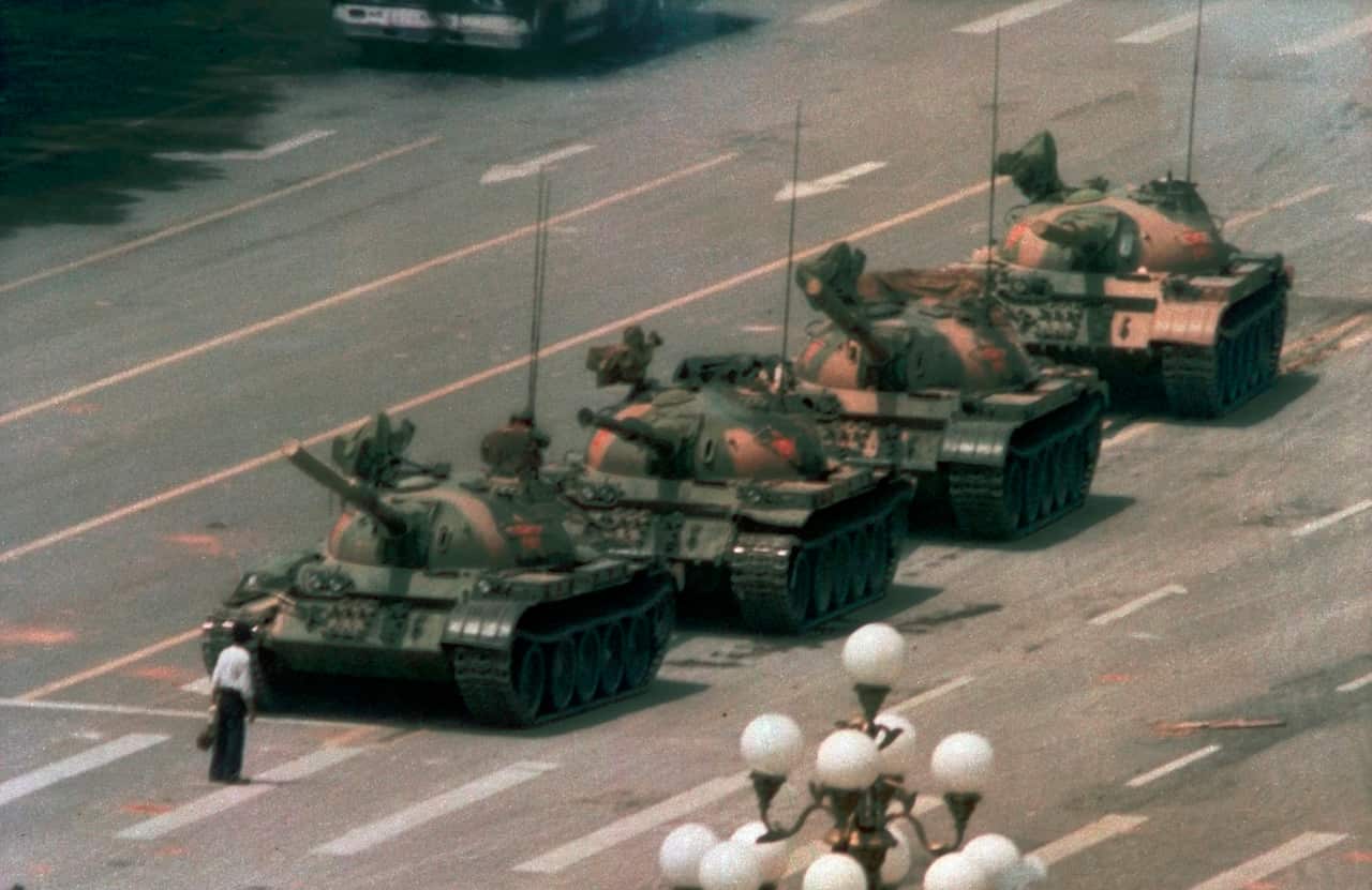 In what could become probably the most iconic image of the 20th century, ‘Tank Man’ faces off with the PLA in Tiananmen Square.