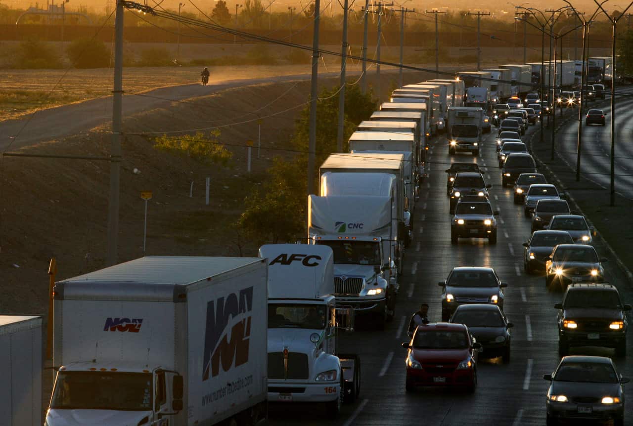 Trucks wait to cross the border with the US in Ciudad Juarez, Mexico.  