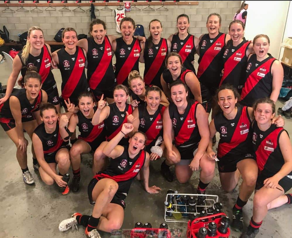 Jamie Howell (fourth from the left, bottom row, with her Yeronga Devils teammates.