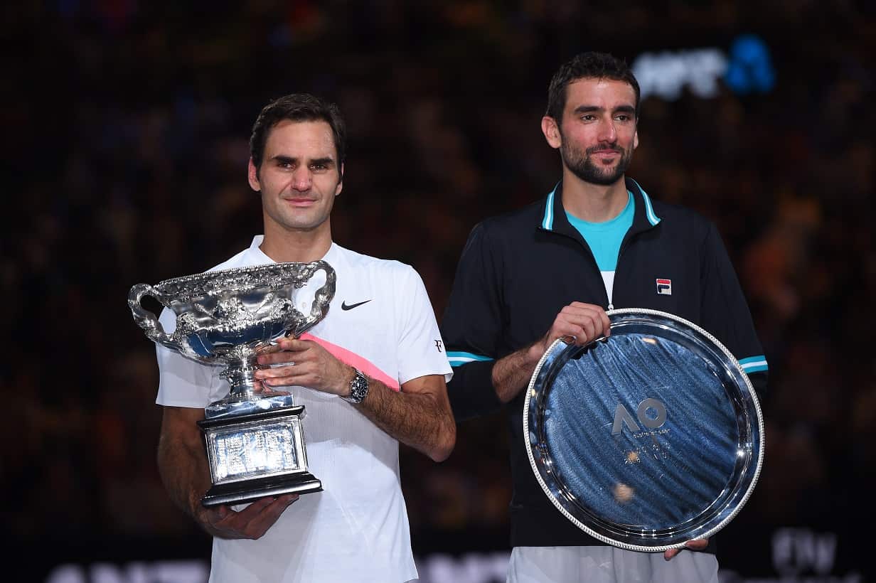 Roger Federer of Switzerland celebrates after winning the Men's Final against Marin Cilic of Croatia.
