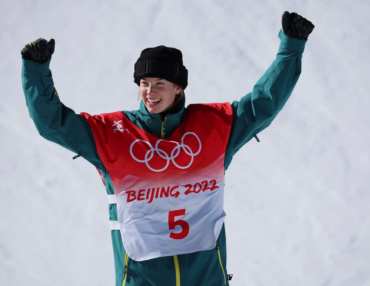 Tess Coady celebrates after winning the bronze medal in the Women's Slopestyle Finals.
