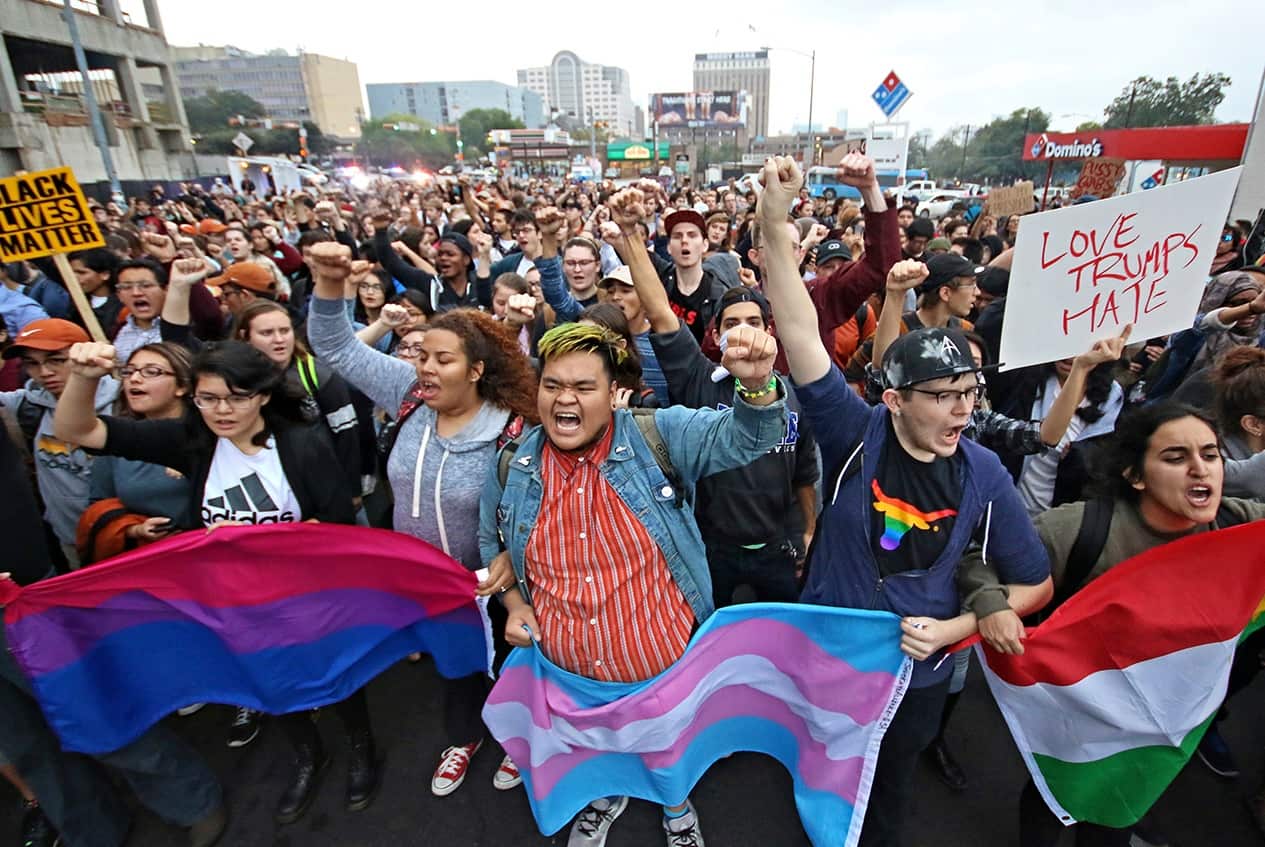 Students at the University of Texas at Austin lead a protest down to Congress Bridge in Austin, Texas. (AAP)
