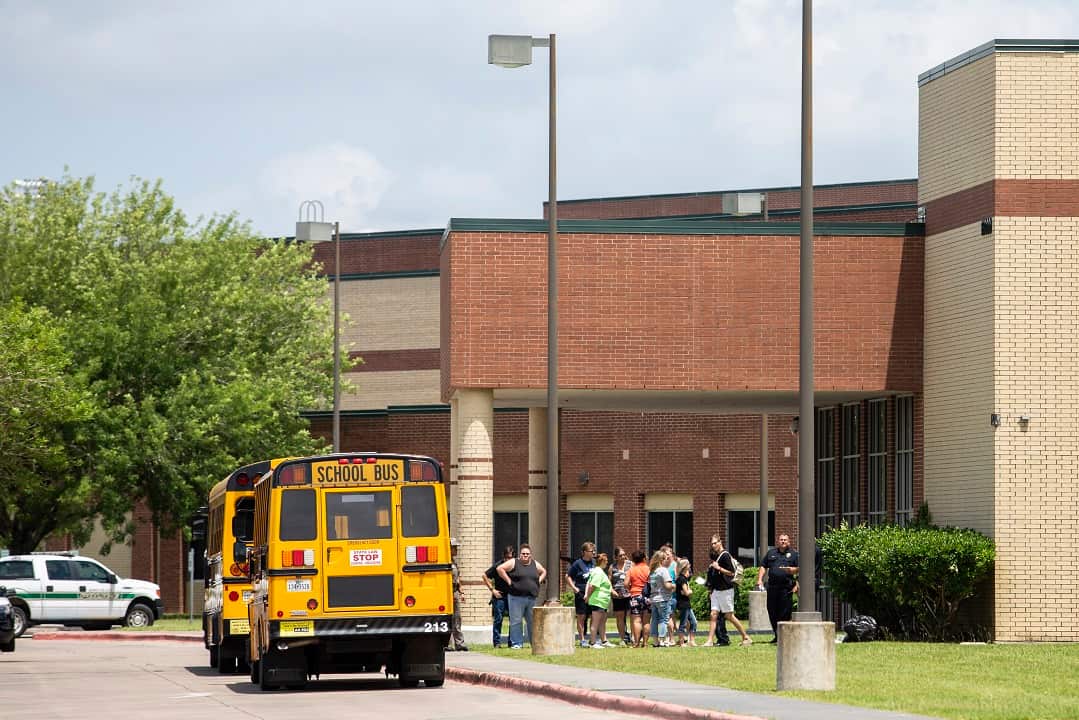 Students return to collect their belongings at Santa Fe High School a day after a mass shooting there left 10 dead, in Santa Fe, Texas.