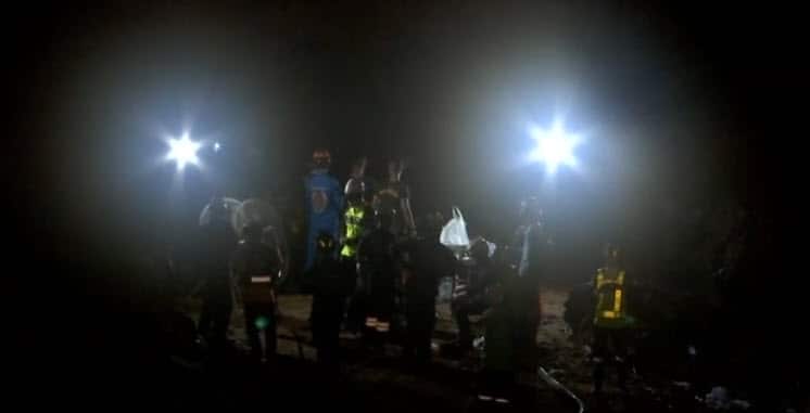  The children entered the cave with their coach on Saturday. 