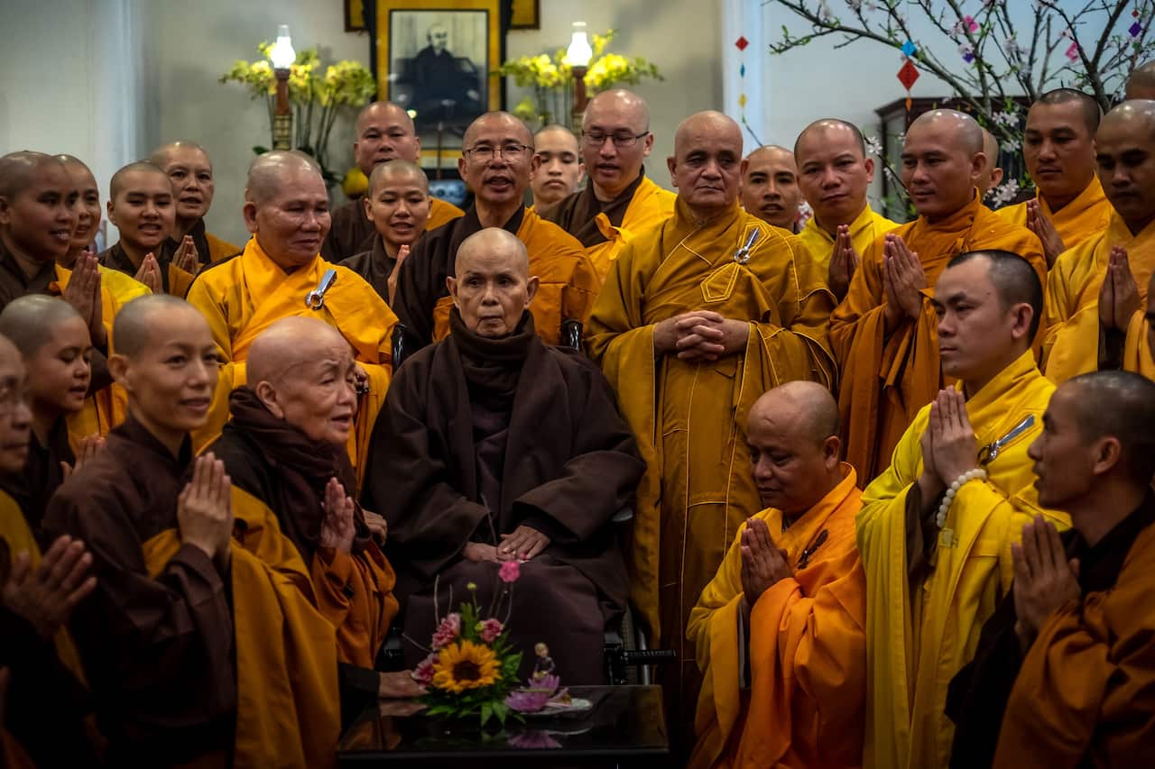 Buddhist monks and nuns with Thich Nhat Hanh at a praying ceremony marking the first day of Lunar New Year at Tu Hieu temple in Vietnam on January 25, 2020.