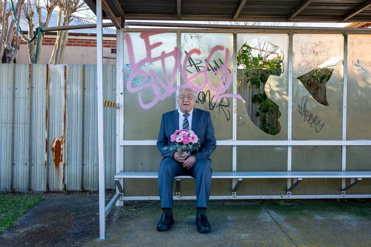 Freshly shaven and armed with a bouquet of flowers, Leo waits to meet Rosie for the first time in Newcastle, NSW. 