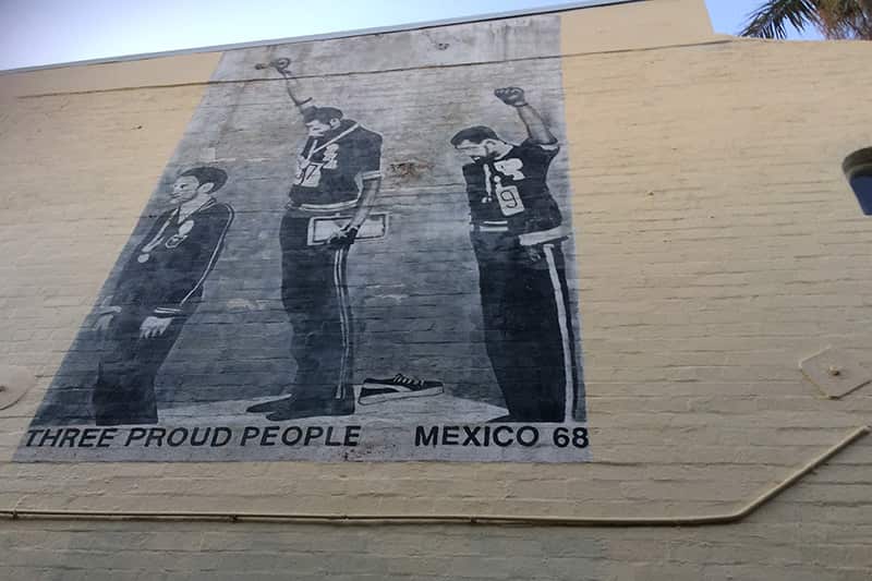 The Three Proud People mural before its restoration.