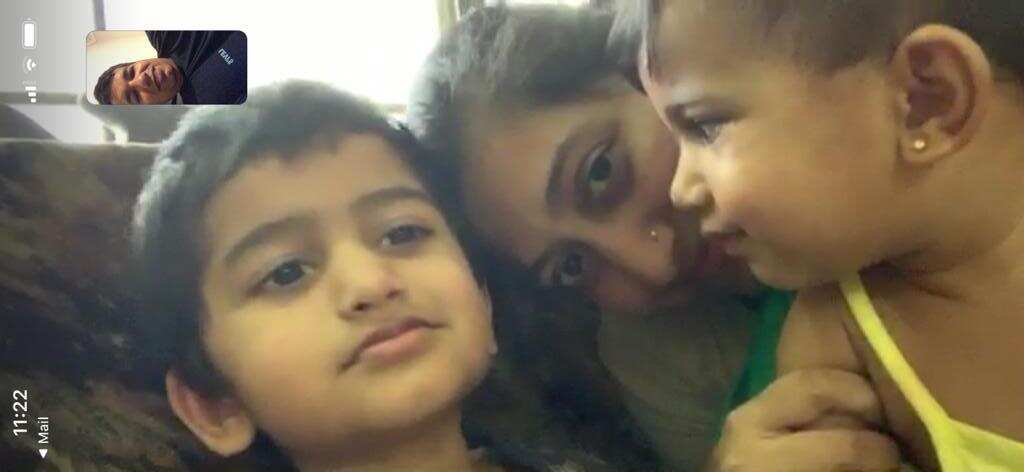 The family communicate via video chat.