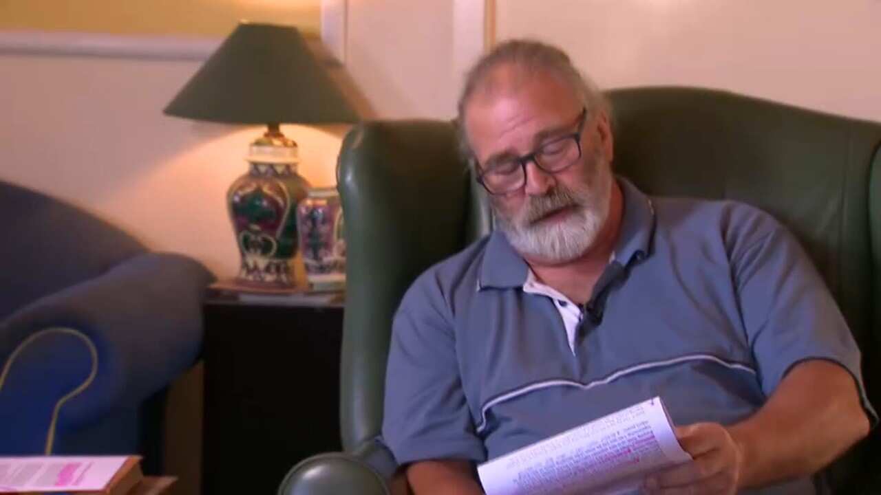 Alex Reid reads from an email sent to the aged care facility, complaining about his mother's care.