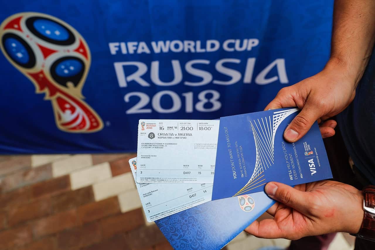 A fan collects his tickets from Kaliningrad's FIFA Venue Ticketing Centre as direct ticket sales start ahead of the 2018 FIFA World Cup.