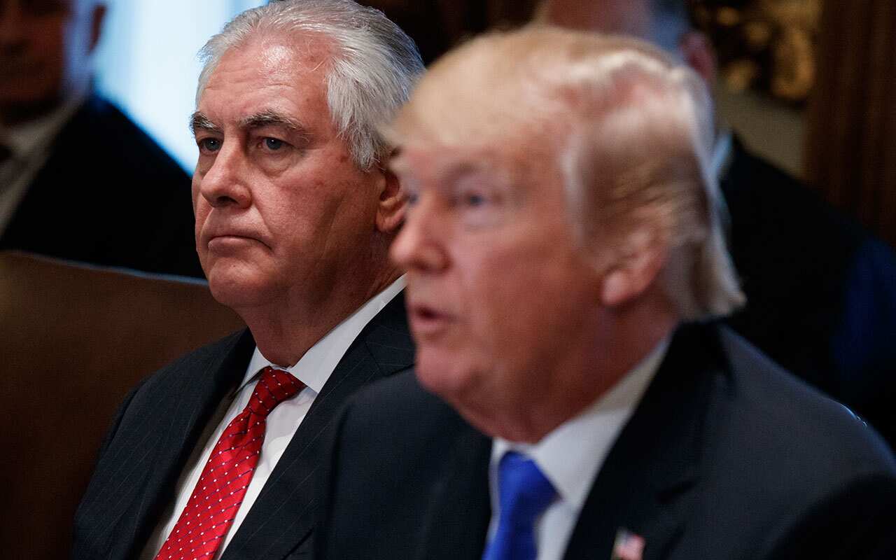 Secretary of State Rex Tillerson listens as President Donald Trump speaks during a cabinet meeting at the White House, Wednesday, Dec. 20, 2017.
